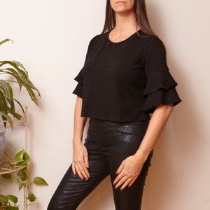 Black crop top with ruffles on sleeves